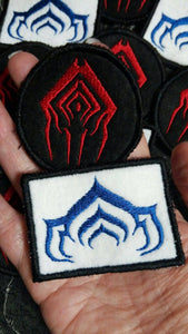 Warframe Lotus and Stalker patches (Inspired by source material)
